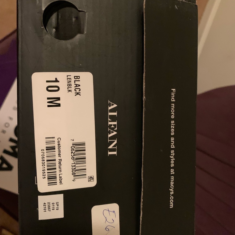 Black leather monogram loafers